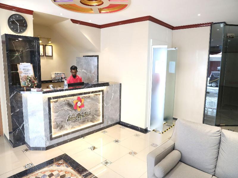 Capital O 90897 Island City Hotel image