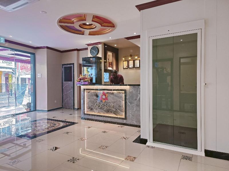 Capital O 90897 Island City Hotel image