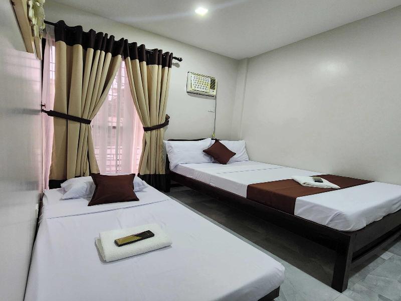 Jmorino Pension House Palawan City Center By Zuzu image
