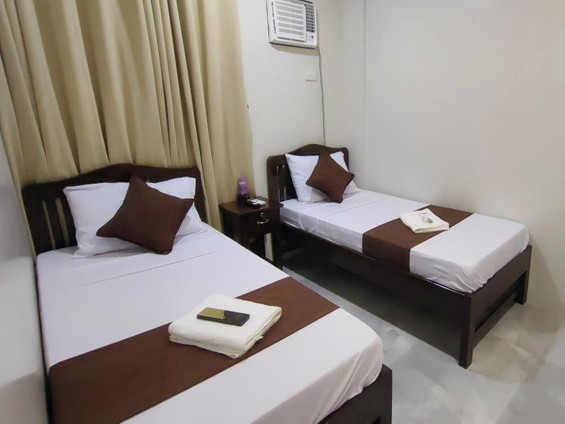 Jmorino Pension House Palawan City Center By Zuzu image