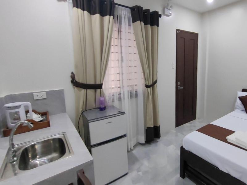 Jmorino Pension House Palawan City Center By Zuzu image