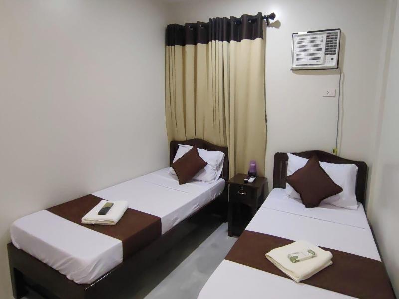 Jmorino Pension House Palawan City Center By Zuzu image