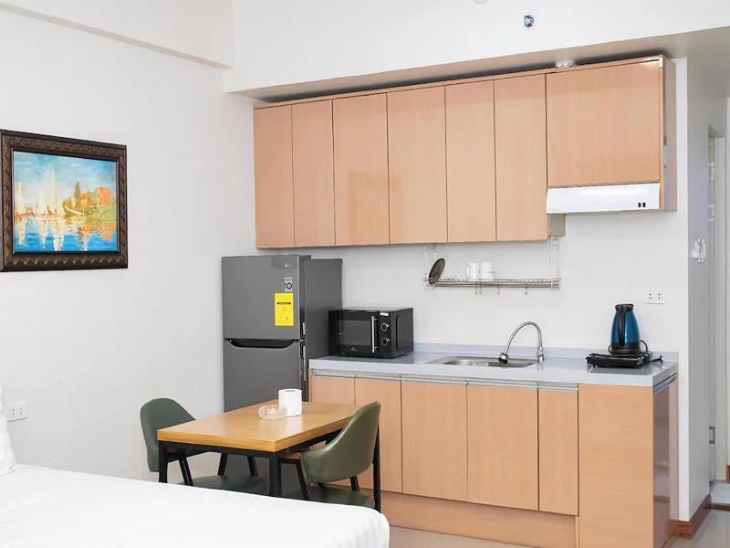 Aimor Condotel near SM City Clark image