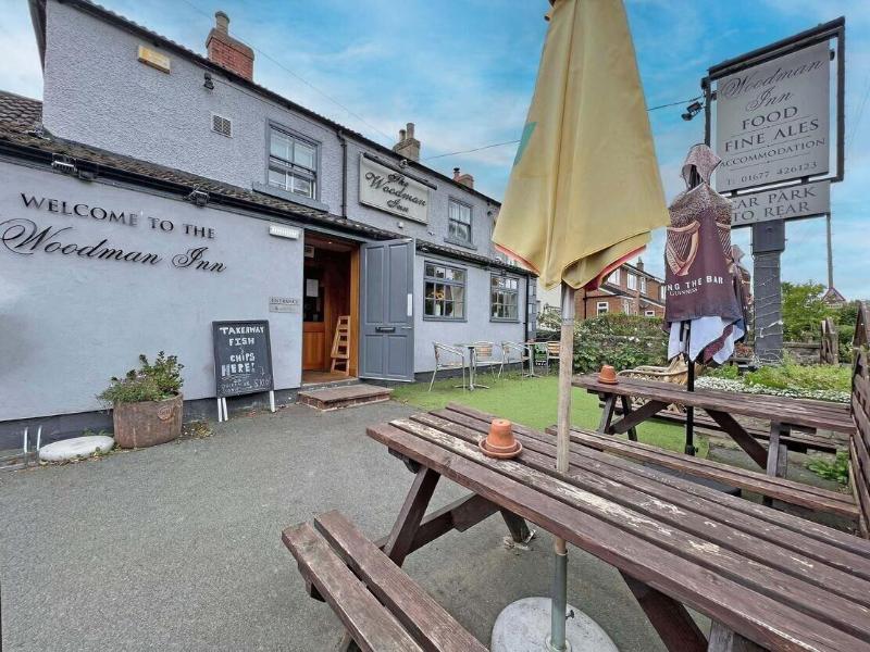 Woodman Inn image