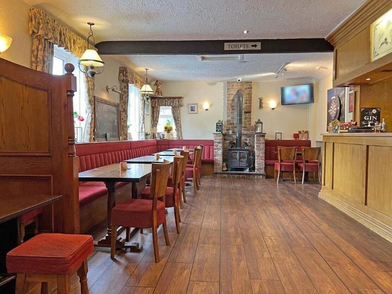 Woodman Inn image