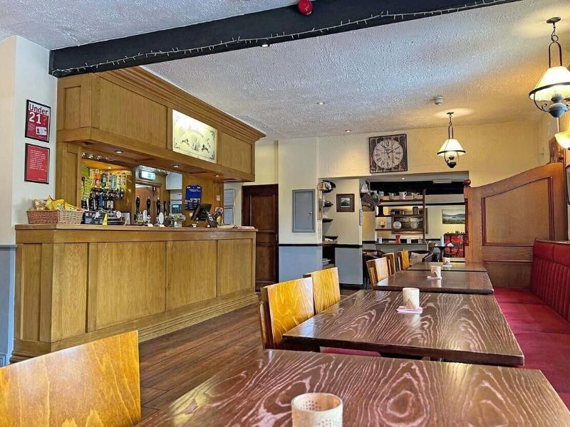Woodman Inn image