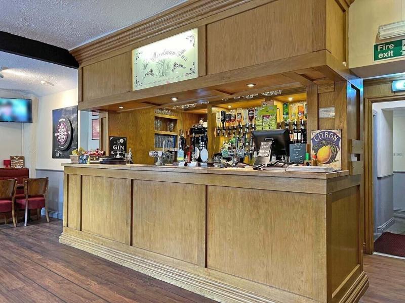 Woodman Inn image