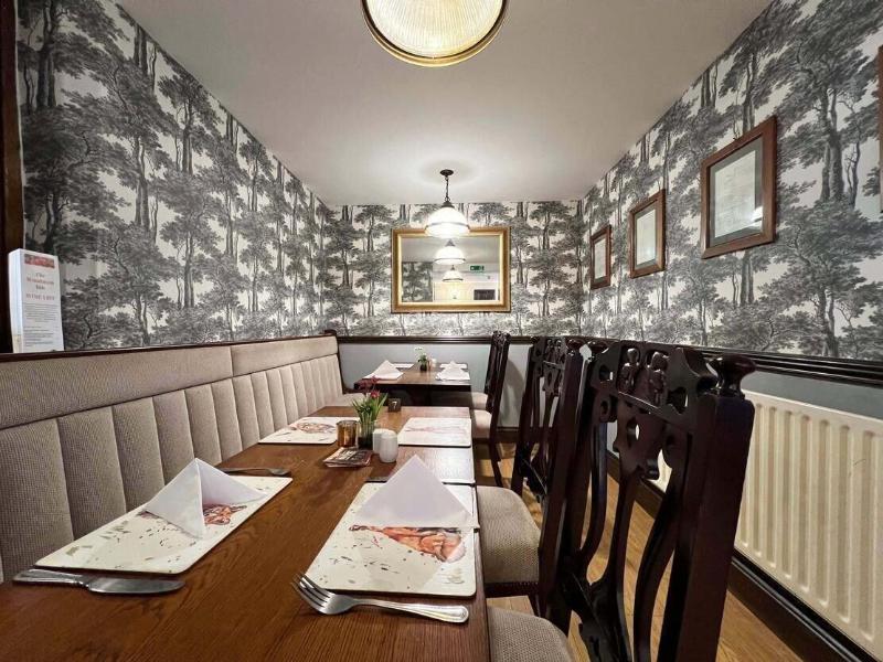 Woodman Inn image