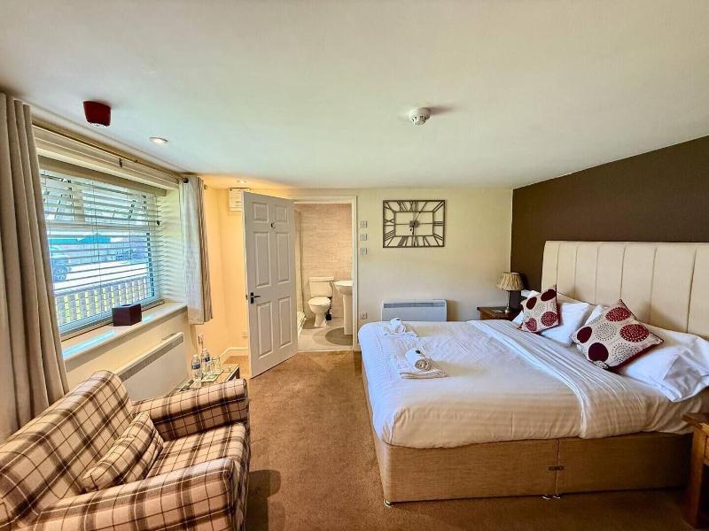 Woodman Inn image