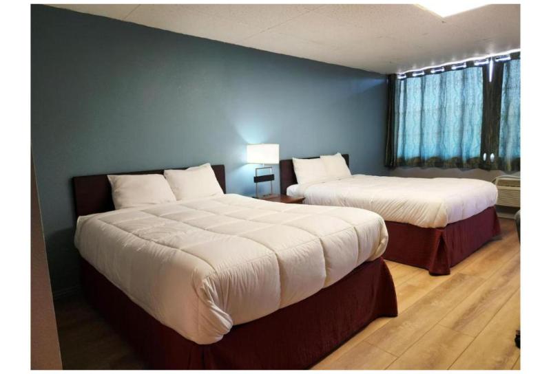 Executive Inn By OYO Queenville Mena image