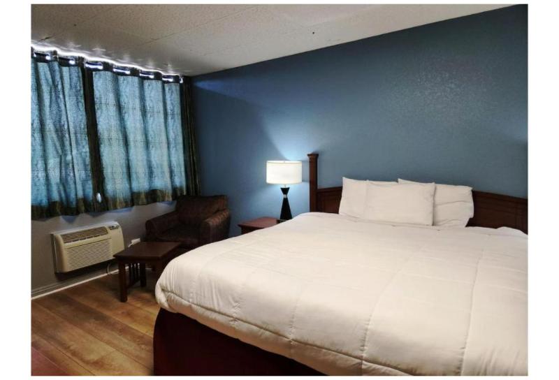 Executive Inn By OYO Queenville Mena image