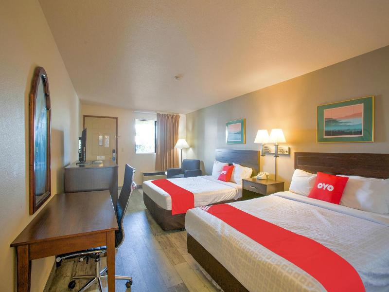 Oyo Woodland Hotel And Suites image