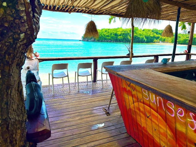 Sand And Tan Beach Hotel image