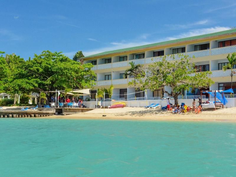 Sand And Tan Beach Hotel image