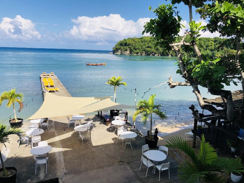 Sand And Tan Beach Hotel image