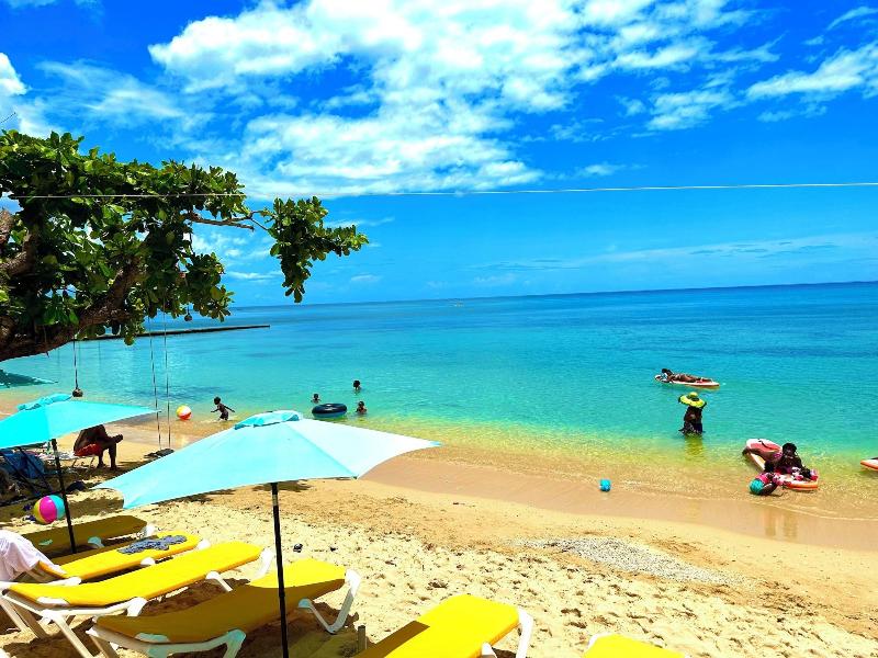 Sand And Tan Beach Hotel image