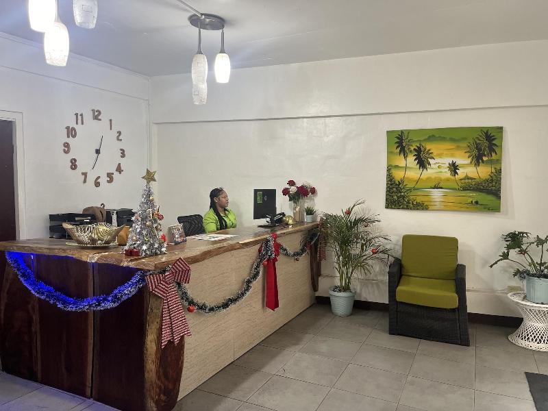 Sand And Tan Beach Hotel image