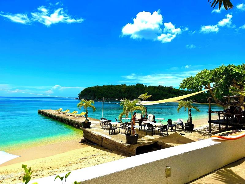 Sand And Tan Beach Hotel image
