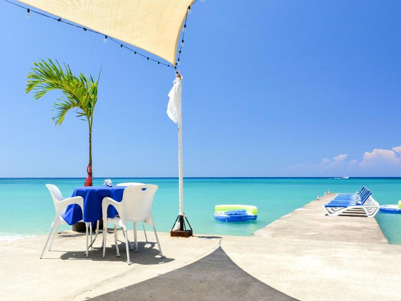 Sand And Tan Beach Hotel image