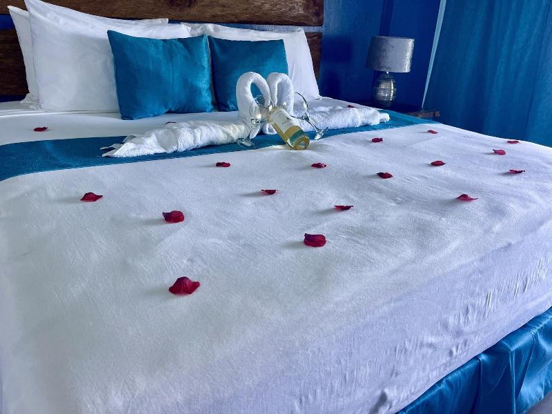 Sand And Tan Beach Hotel image