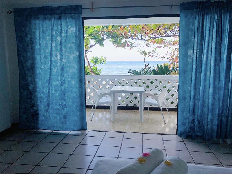Sand And Tan Beach Hotel image