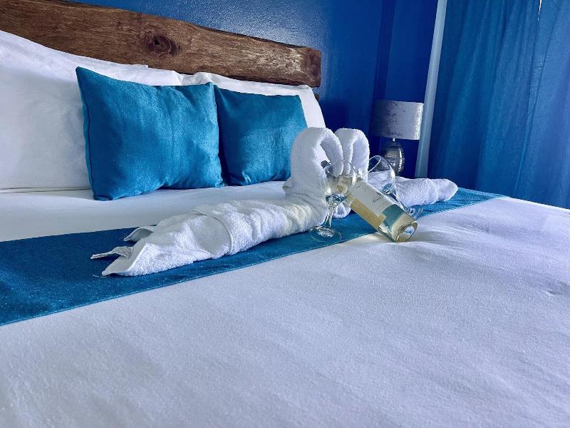 Sand And Tan Beach Hotel image