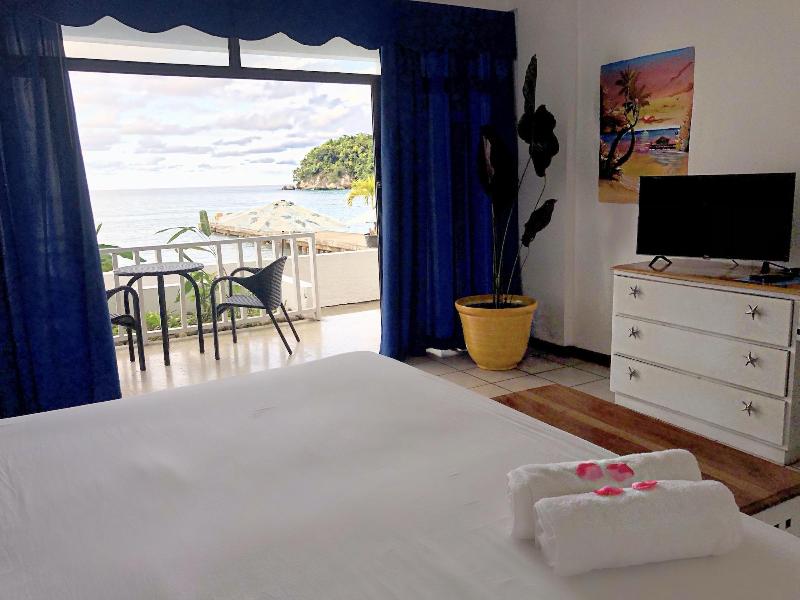 Sand And Tan Beach Hotel image