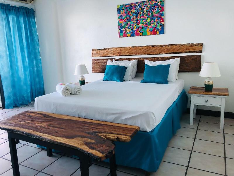 Sand And Tan Beach Hotel image