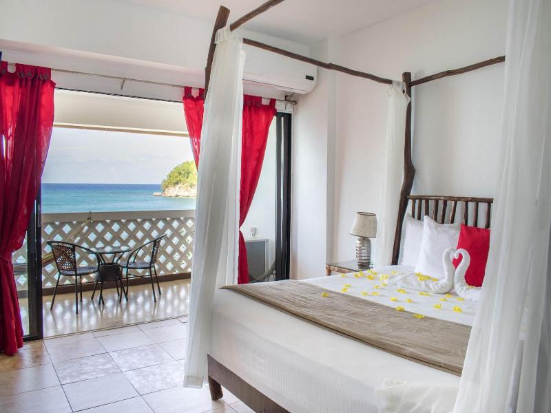 Sand And Tan Beach Hotel image