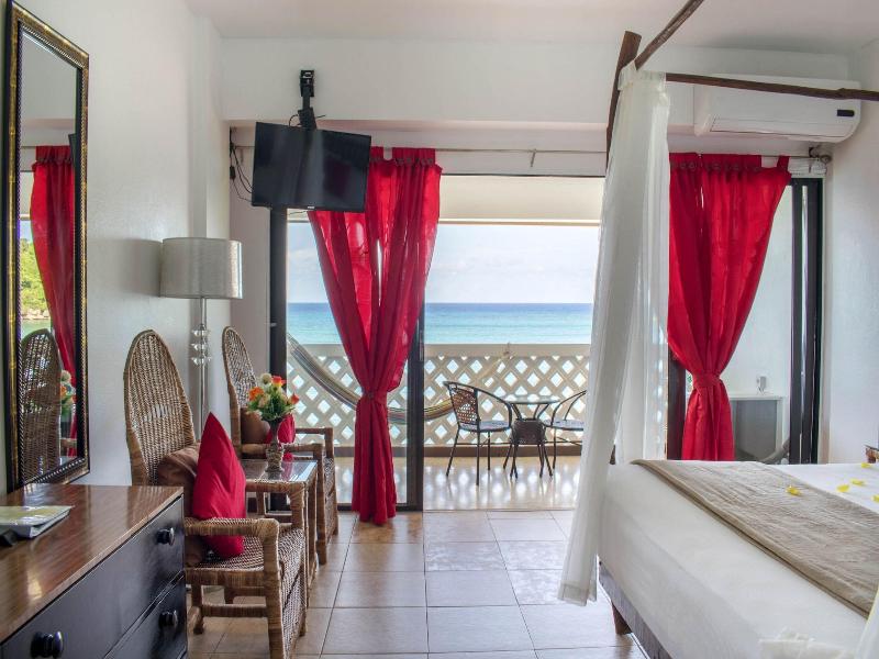 Sand And Tan Beach Hotel image