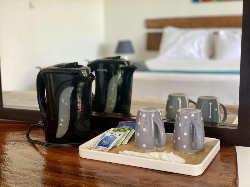 Sand And Tan Beach Hotel image