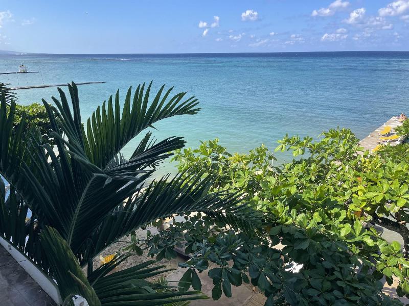 Sand And Tan Beach Hotel image