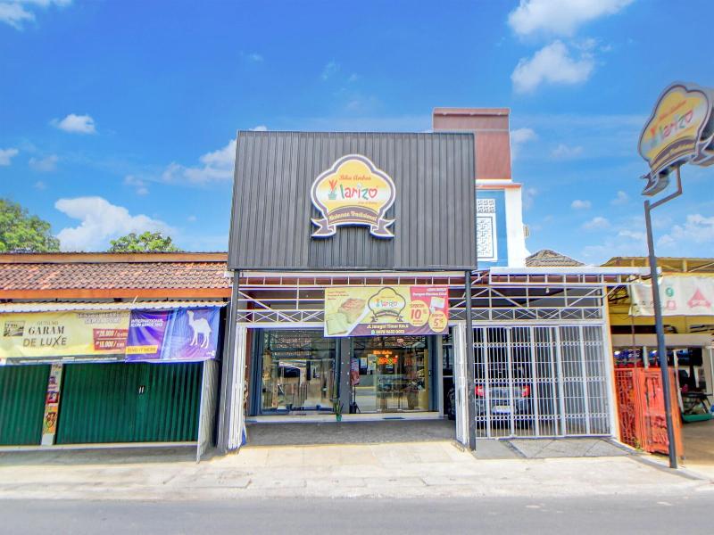 Capital O 94314 Sunny Co Living image