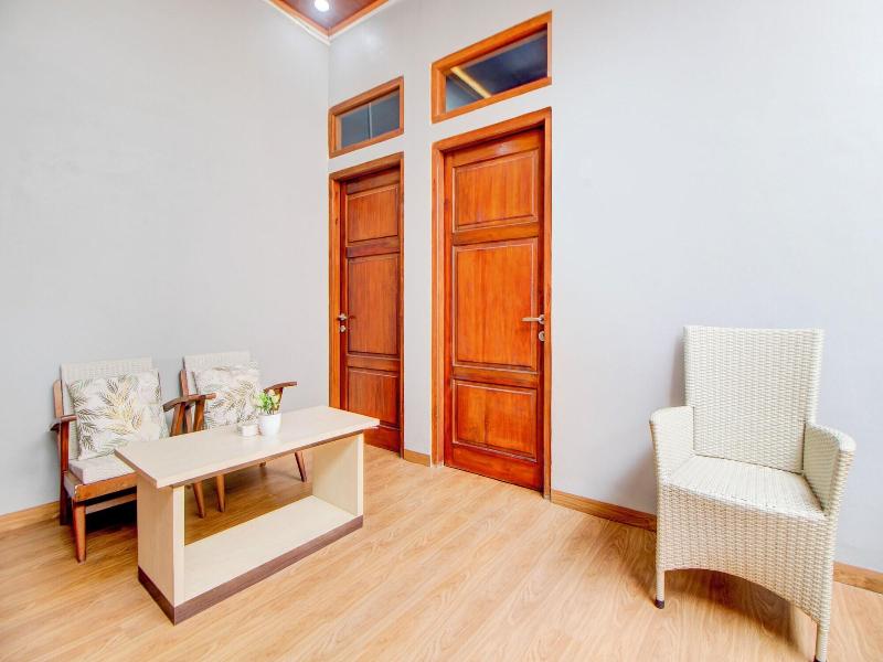 Capital O 94314 Sunny Co Living image