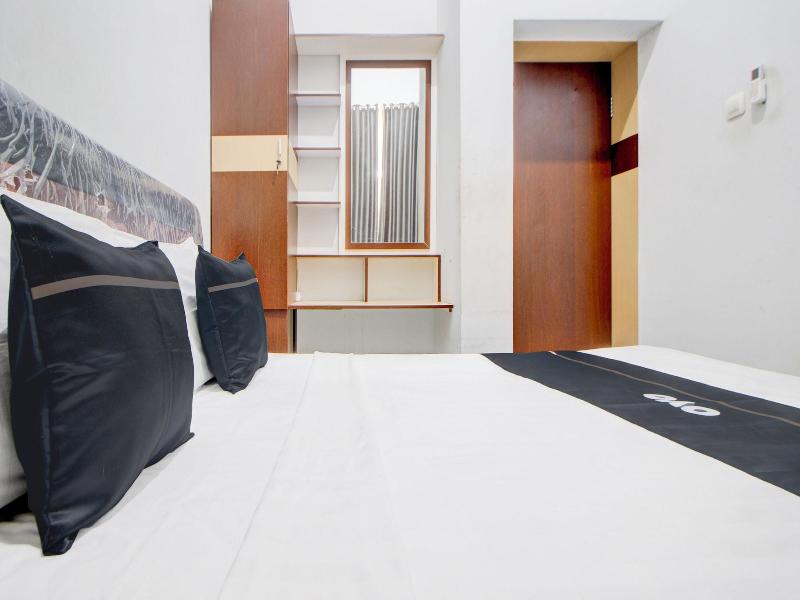 Capital O 94314 Sunny Co Living image