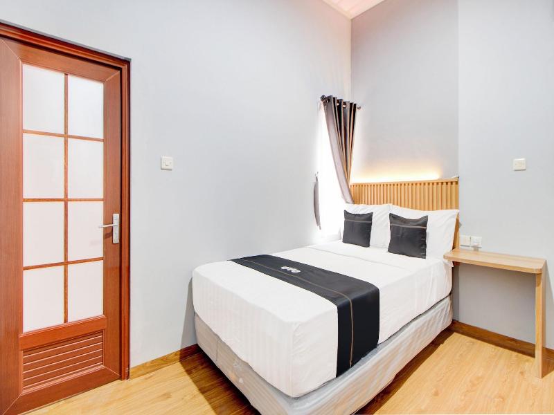 Capital O 94314 Sunny Co Living image