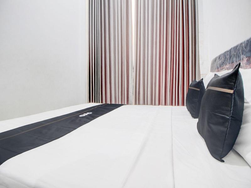 Capital O 94314 Sunny Co Living image