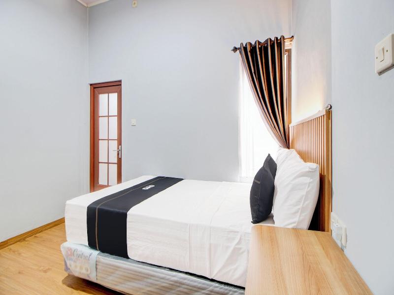 Capital O 94314 Sunny Co Living image