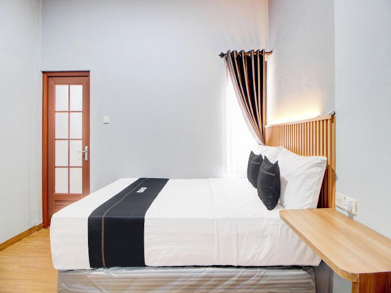 Capital O 94314 Sunny Co Living image