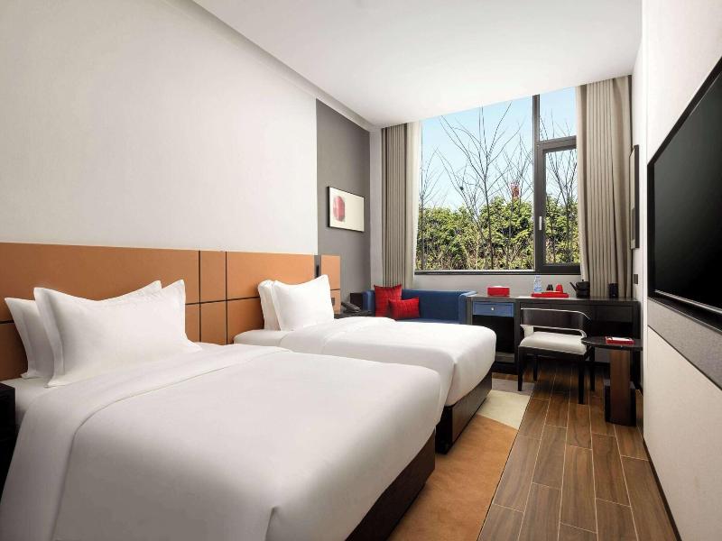Ramada By Wyndham Xishuangbanna Jinghong image