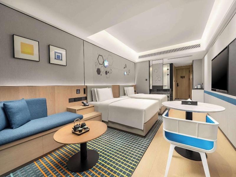 Microtel By Wyndham Xishuangbanna Mengle image
