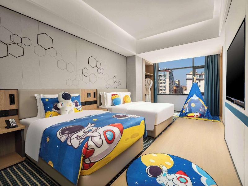 Microtel By Wyndham Xishuangbanna Mengle image