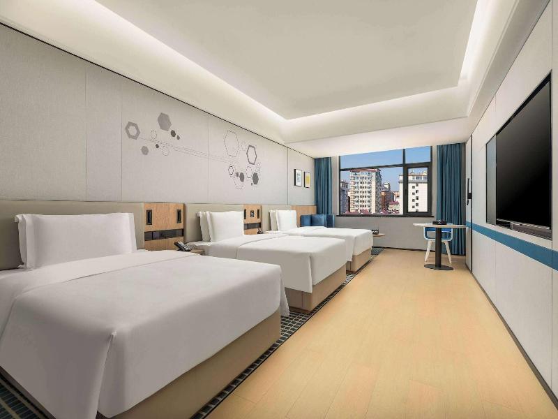 Microtel By Wyndham Xishuangbanna Mengle image