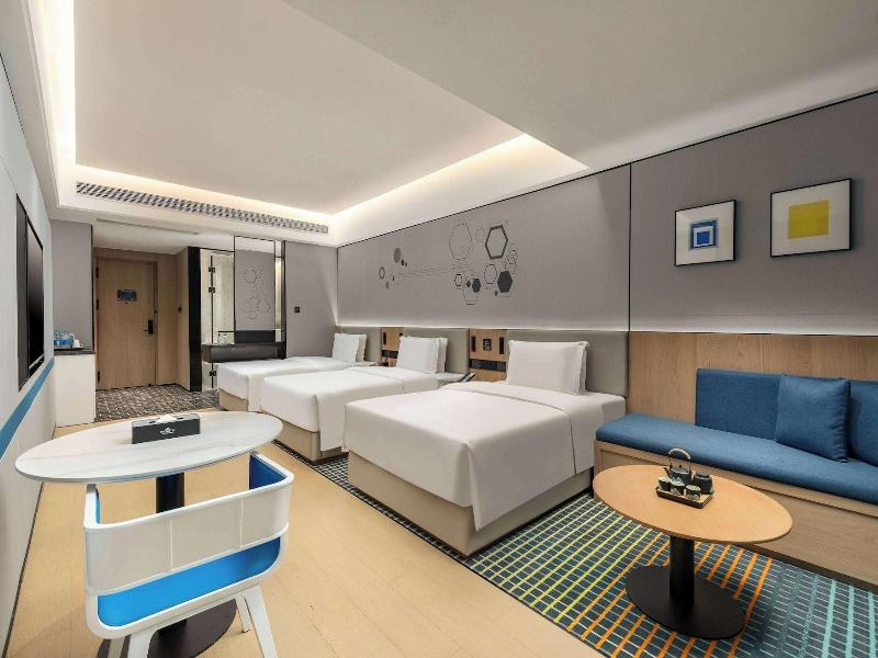 Microtel By Wyndham Xishuangbanna Mengle image