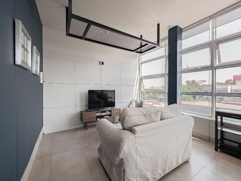 Bed In Mixed Room Near Coyoacan image
