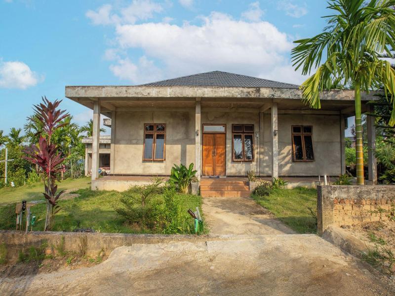 Hotel O Homestay Romauli Kampung Radja image