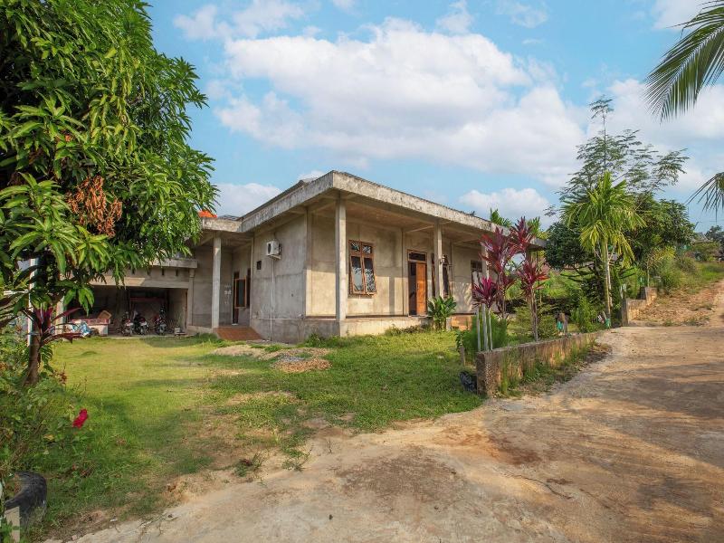 Hotel O Homestay Romauli Kampung Radja image
