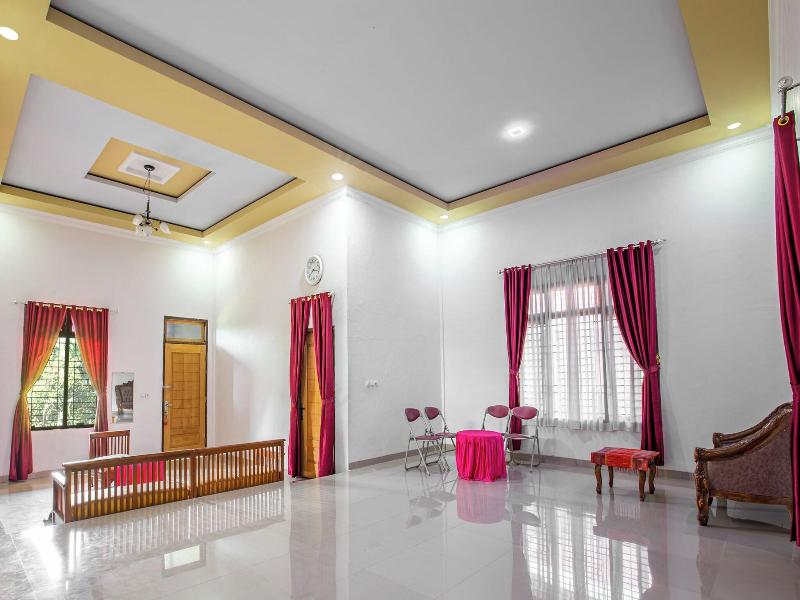 Hotel O Homestay Romauli Kampung Radja image