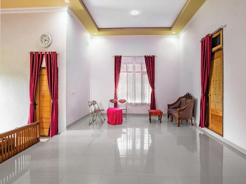 Hotel O Homestay Romauli Kampung Radja image