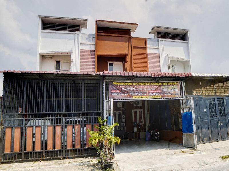 Hotel O Penginapan Syariah Faster Inn image